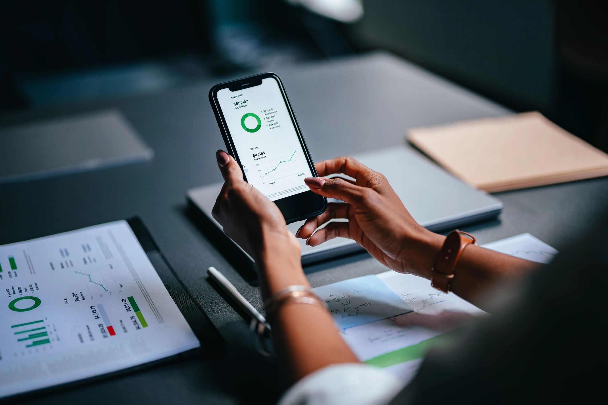 Person reviewing analytics on a smartphone representing social media setup